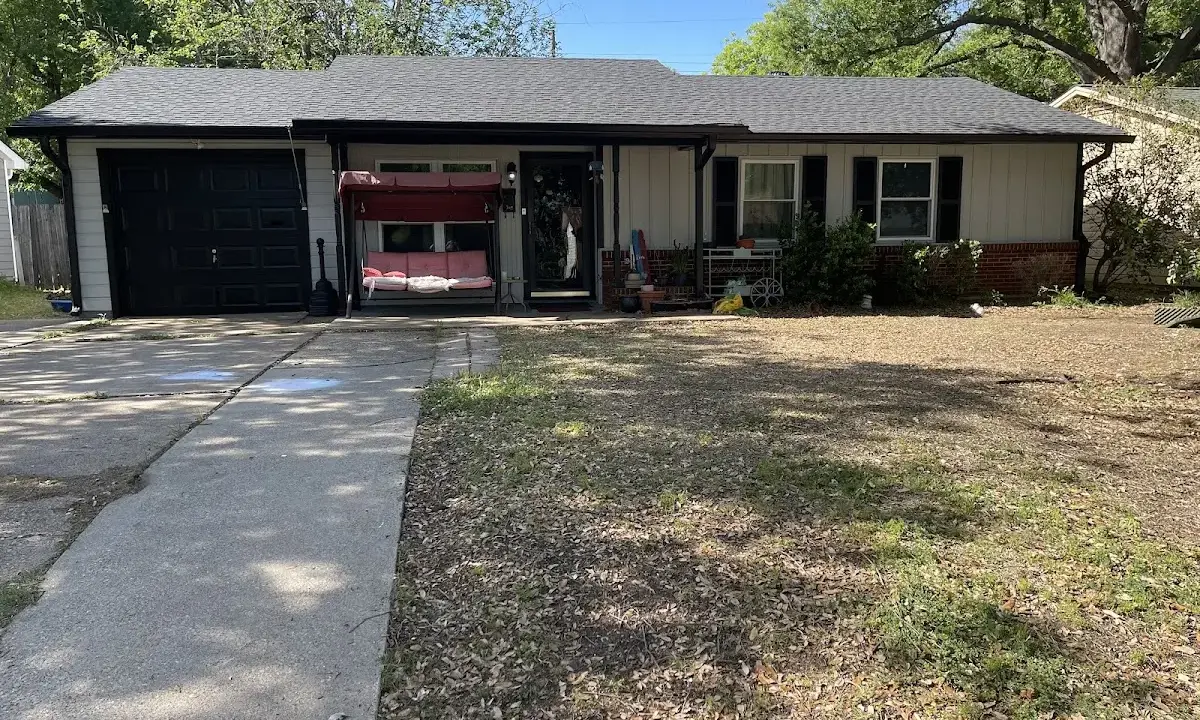 Roof Replacement crew at work on a residential roof in Hattiesburg